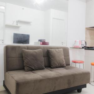 Homey and Cozy 2BR Bassura City Apartment near Mall By Travelio