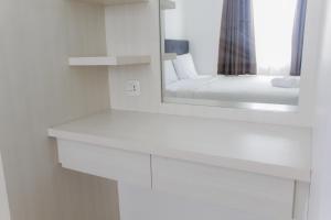 Homey and Cozy 2BR Bassura City Apartment near Mall By Travelio