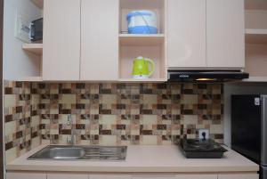 Cozy Studio at Bogor Icon Apartment By Travelio