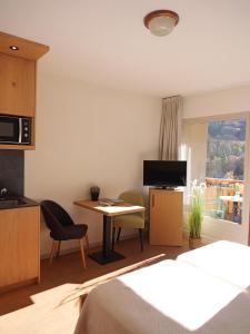 Appartements Residence La Rochetaillee : photos des chambres