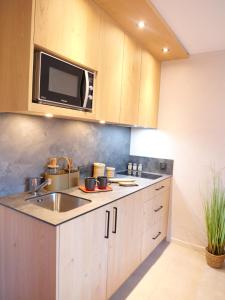 Appartements Residence La Rochetaillee : Studio Confort avec Balcon (2 Adultes)