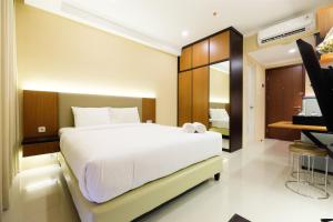 Warm Cozy Studio Room Signature Park Grande Apartment By Travelio
