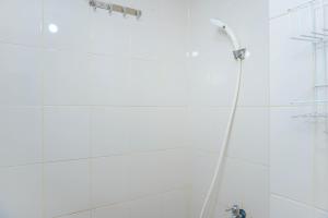 Cozy Stay and Homey Studio Apartment at Bassura City Apartment By Travelio