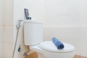 Cozy Stay and Homey Studio Apartment at Bassura City Apartment By Travelio