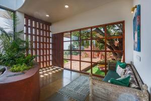 SaffronStays Ikigai Bonsai - 8BR Balinese-Indian villa estate with 2 infinity pools, jacuzzi & lotus pond