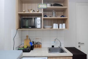 Modern 2BR Apartment Springlake Summarecon Bekasi By Travelio