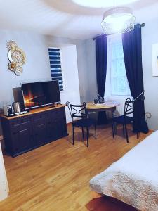 Maisons d'hotes Coeur de Ville Montbeliard : photos des chambres