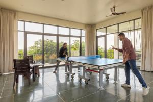 SaffronStays Camelot by the Lake - 3BR villa with glass walls, TT, projector, and gardens, Udaipur