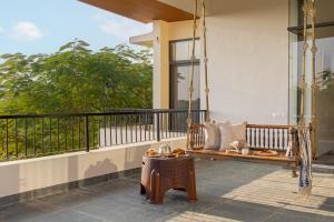 SaffronStays Camelot by the Lake - 3BR villa with glass walls, TT, projector, and gardens, Udaipur