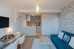 Appartements Le Cabourgeais centre ville : photos des chambres