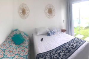 Casa em Arembepe com quatro suítes