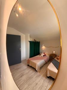 Maisons de vacances Un petit coin de paradis : photos des chambres