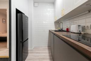 Spodek Stylish Apartment by BookingHost