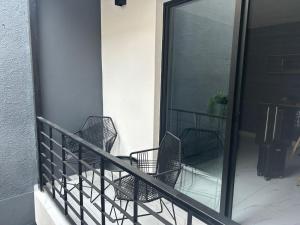 Vidrio Suites Col Americana