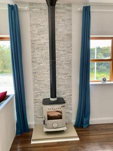 Cosy Studio Cabinin nature with stove