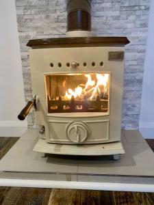 Cosy Studio Cabinin nature with stove