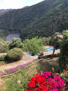 Maisons de vacances Maison de Charme avec piscine et Jacuzzi au dessus de la riviere : photos des chambres