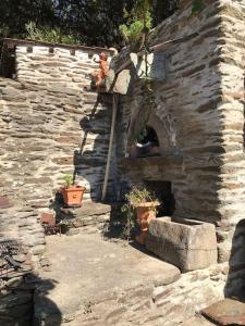 Maisons de vacances Maison de Charme avec piscine et Jacuzzi au dessus de la riviere : photos des chambres