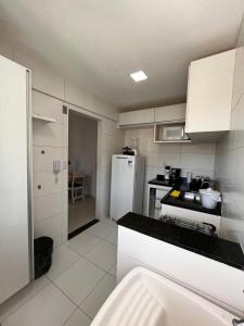 Praticidade e Aconchego: Apto. a 7min da Praia