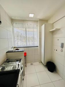 Praticidade e Aconchego: Apto. a 7min da Praia