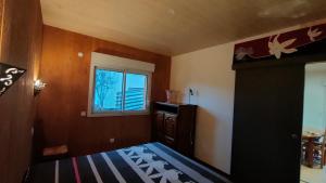 Chalets chalet pour amoureux a Gerardmer : photos des chambres