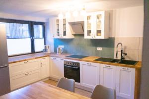 Ferienwohnung "Wasser" mit Sauna im Ferienhaus am Waldbach