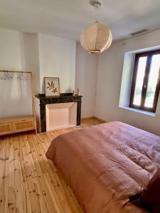 Appartements Maison Henriette - Au plus pres de la Cite Medievale : photos des chambres
