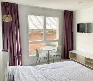 Appartements Studio proche gare et sanctuaire : photos des chambres