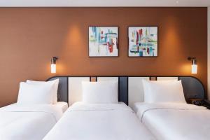 Phòng Loại Sang Có 3 Giường Đơn (Deluxe Room with 3 Single Beds)