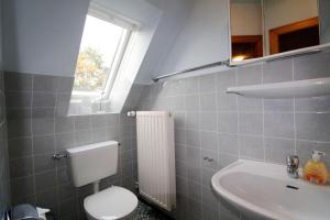 Ferienwohnung-Dueneneck-14-OG-links