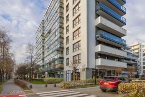 Family Apartment Cybernetyki with AC and Parking by Noclegi Renters