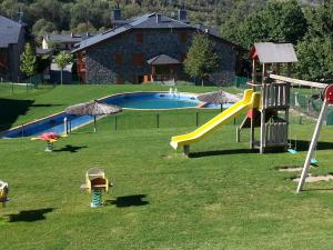 Appartements Apartamento con piscina en Osseja : photos des chambres