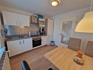 Ferienwohnung Ostseeheim - 1 Reihe mit Meerblick