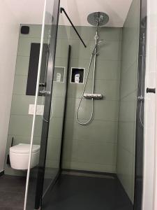 Appartements The Coach House : photos des chambres