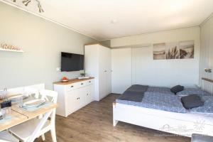 49 Ferienwohnung NEU am Südstrand Fehmarn 4U App.64-212