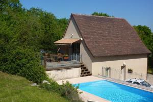 Maisons de vacances Maison spacieuse a Loubressac avec piscine privee : photos des chambres