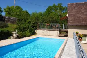 Maisons de vacances Maison spacieuse a Loubressac avec piscine privee : photos des chambres
