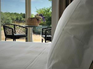 Hotels Eco-Domaine La Fontaine - HOTEL-SPA - Plage de la Fontaine aux Bretons : photos des chambres