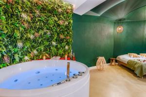 Appartements EROS - Loft entier avec Balneo & Retroprojecteur : photos des chambres
