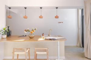 Appartements Hermes - Appartement avec jacuzzi scandinave : photos des chambres