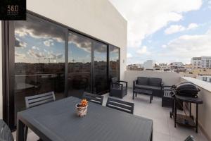 Penthouse and BBQ Kitchen Island & Massive living by 360 Estates