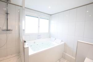 Appartements Appartement baignoire balneo : photos des chambres
