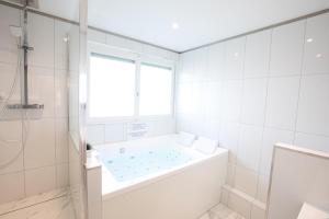 Appartements Appartement baignoire balneo : photos des chambres