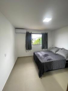 Casa Ipe Branco Mariscal