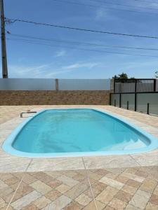 Casa com Piscina em Pontal do Sul