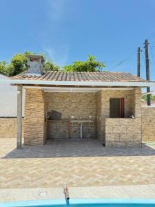 Casa com Piscina em Pontal do Sul