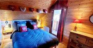 Chalets Chalet de la Grimpette au coeur de Gerardmer : photos des chambres