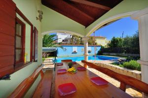 Family friendly apartments with a swimming pool Zadar - 23646