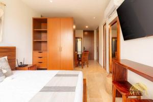 NHOA 303A Lux 2BR Condo Pool View in Aldea Zama