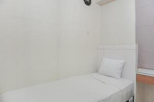 Elegant and Comfy 2BR above Mall at Bassura City Apartment By Travelio